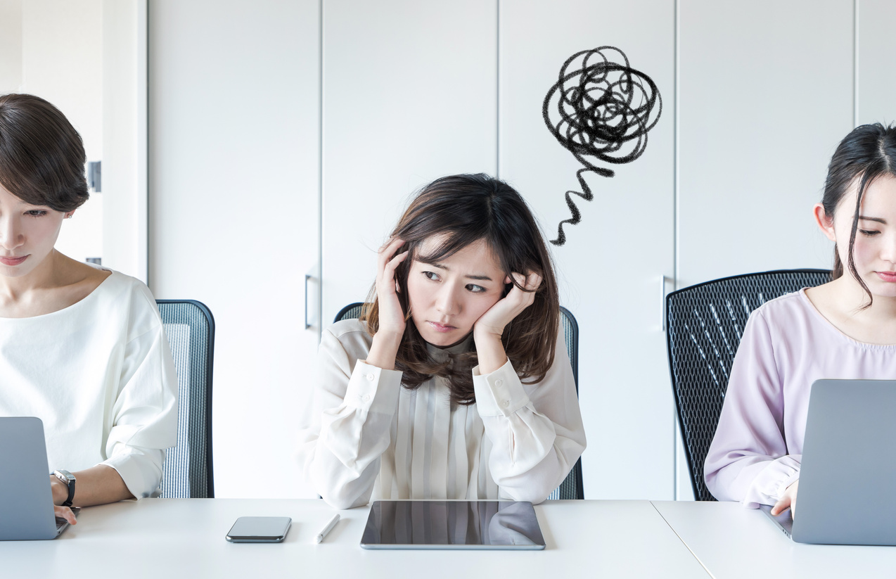 Worrying asian woman in the office.